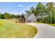 Gray house exterior with attached garage and landscaping at 458 Florence Rd, Douglasville, GA 30134