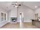 Open living room with brick fireplace and high ceilings at 458 Florence Rd, Douglasville, GA 30134