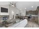 Spacious living room with fireplace and kitchen views at 458 Florence Rd, Douglasville, GA 30134