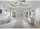 Main bedroom with a bed, dresser, and en-suite bathroom at 458 Florence Rd, Douglasville, GA 30134
