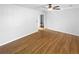 Hardwood floor bedroom with neutral wall colors and ceiling fan at 1048 Plainview Dr, Marietta, GA 30066