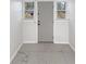 Bright entryway with gray door and marble-look flooring at 1048 Plainview Dr, Marietta, GA 30066