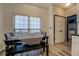 Cozy breakfast nook with a table and bench seating near laundry at 2587 Alvecot Cir, Atlanta, GA 30339