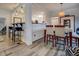 Modern dining area with breakfast bar and hardwood floors at 2587 Alvecot Cir, Atlanta, GA 30339
