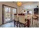 Bright dining area with glass table and access to backyard at 2587 Alvecot Cir, Atlanta, GA 30339
