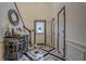 Modern entryway with black and white flooring and console table at 2587 Alvecot Cir, Atlanta, GA 30339