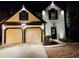 Stunning two-story home with a two-car garage and updated exterior lighting at 2587 Alvecot Cir, Atlanta, GA 30339