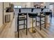 Kitchen breakfast bar with three gold and black velvet barstools at 2587 Alvecot Cir, Atlanta, GA 30339