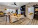 Spacious living room with sectional sofa, fireplace, and hardwood floors at 2587 Alvecot Cir, Atlanta, GA 30339