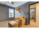 Relaxing sitting area with a comfy chair, ottoman, and floor lamp at 2587 Alvecot Cir, Atlanta, GA 30339
