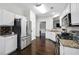 Kitchen with stainless steel appliances, granite countertops, and ample cabinet space at 2915 Saint Andrews Ct, Cumming, GA 30041