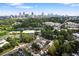 Aerial view of townhomes, showcasing surrounding cityscape and lush green spaces at 622 Bellemeade Nw Ave # 7, Atlanta, GA 30318