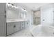 Elegant bathroom with soaking tub, shower, and double vanity at 622 Bellemeade Nw Ave # 7, Atlanta, GA 30318
