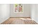 Bright bedroom featuring hardwood floors and a ceiling fan at 622 Bellemeade Nw Ave # 7, Atlanta, GA 30318
