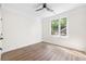 Bright bedroom featuring hardwood floors and a ceiling fan at 622 Bellemeade Nw Ave # 7, Atlanta, GA 30318