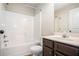 Clean bathroom featuring a shower-tub combination and vanity at 520 Harmony Way, Locust Grove, GA 30248