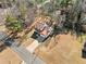 Aerial view of two-story house with driveway and yard at 4496 Whitt Station Nw Run, Acworth, GA 30101