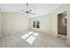 Bright bedroom with wood-look floors and a view of the woods at 4496 Whitt Station Nw Run, Acworth, GA 30101