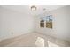 Bright bedroom with hardwood floors and a window offering wooded views at 4496 Whitt Station Nw Run, Acworth, GA 30101
