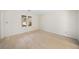 Spacious bedroom with hardwood floors and large window at 4496 Whitt Station Nw Run, Acworth, GA 30101