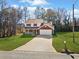 Two-story house with a spacious yard and attached garage at 4496 Whitt Station Nw Run, Acworth, GA 30101