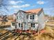 Two-story house with white siding, brown roof, and landscaping at 4496 Whitt Station Nw Run, Acworth, GA 30101