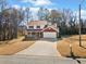 Two-story house with red shutters and attached garage at 4496 Whitt Station Nw Run, Acworth, GA 30101