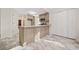 Modern kitchen with light cabinets and marble flooring at 4496 Whitt Station Nw Run, Acworth, GA 30101