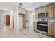 Eat-in kitchen with view into adjacent living room at 4496 Whitt Station Nw Run, Acworth, GA 30101