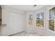 Bright kitchen nook with large windows and tile floor at 4496 Whitt Station Nw Run, Acworth, GA 30101