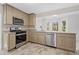 Updated kitchen featuring stainless steel appliances at 4496 Whitt Station Nw Run, Acworth, GA 30101