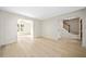 Open living space with hardwood floors and views to the dining area and staircase at 4496 Whitt Station Nw Run, Acworth, GA 30101