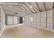 Spacious garage with overhead door and ample storage at 5068 Maple Dr, Forest Park, GA 30297