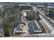 Aerial view of townhouses and surrounding landscape at 713 Trevett Way, Marietta, GA 30062