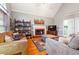 Living room with hardwood floors, fireplace and neutral decor at 786 Marshview Nw Ln, Kennesaw, GA 30152