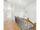 Upstairs hallway and banister on a second floor at 116 Cottage Gate Ln, Roswell, GA 30076