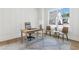 Bright office space with a large window, creating a perfect work-from-home environment at 116 Cottage Gate Ln, Roswell, GA 30076
