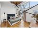 Spacious bedroom with hardwood floors and high ceilings at 1661 La France Ne St # 326, Atlanta, GA 30307