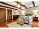 Spacious bedroom with hardwood floors and wood beams at 305 Carrolls Way, Fayetteville, GA 30215