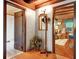 Charming entryway with terracotta tile floors and a coat rack at 305 Carrolls Way, Fayetteville, GA 30215