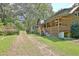 Rustic log cabin with a wrap around porch and large backyard at 305 Carrolls Way, Fayetteville, GA 30215