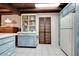 Quaint kitchen with light blue cabinets and white appliances at 305 Carrolls Way, Fayetteville, GA 30215