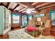 Spacious living area with log cabin accents and built-in shelves at 305 Carrolls Way, Fayetteville, GA 30215