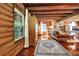 Rustic living room with wood beams and stone fireplace at 305 Carrolls Way, Fayetteville, GA 30215