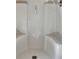 Clean white shower stall with built-in seats at 305 Carrolls Way, Fayetteville, GA 30215