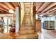 Wooden staircase leading to the upper level at 305 Carrolls Way, Fayetteville, GA 30215