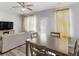 Bright dining area with table and chairs, adjacent to living room at 8471 Douglas Trail, Jonesboro, GA 30236