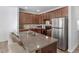 Modern kitchen with stainless steel appliances and granite countertops at 8471 Douglas Trail, Jonesboro, GA 30236