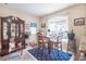 Charming dining area with a wooden table and chairs at 120 Creekwood Dr, Woodstock, GA 30188