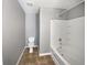 Full bathroom with tub, shower, and tile flooring at 2891 Vining Ridge Ter, Decatur, GA 30034